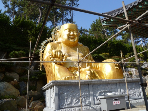 One big Buddha (the scaffolding is to hang the lanterns for the festival).